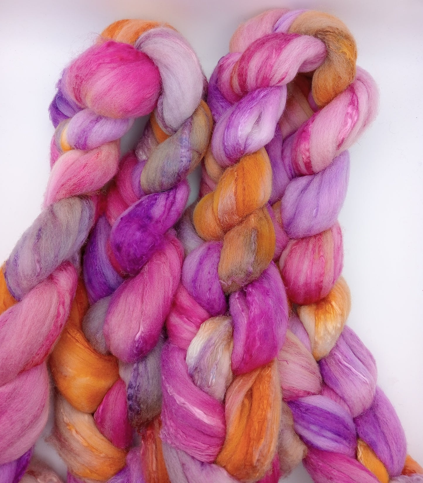 "Pinks multi" 100G Merino/Silk hand dyed fibre combed top